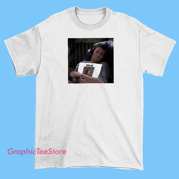 Chandler Holding Frank Ocean Album Tee Shirts 1 Graphic T-shirt featuring Chandler Bing from Friends holding a Frank Ocean vinyl record, with a colorful and artistic design that blends pop culture and music elements.