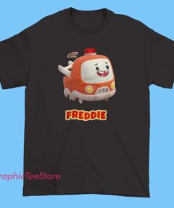 Cory Carson Freddie Tee Shirts 3 A T-shirt featuring a cute and colorful graphic of Freddie from the Cory Carson series. The design may include playful illustrations of Freddie, fun typography, and vibrant colors, making it ideal for young fans of the animated series and its characters.