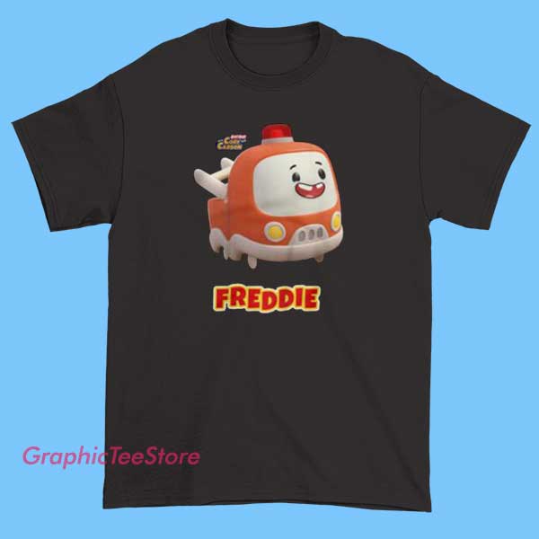 Cory Carson Freddie Tee Shirts 2 A T-shirt featuring a cute and colorful graphic of Freddie from the Cory Carson series. The design may include playful illustrations of Freddie, fun typography, and vibrant colors, making it ideal for young fans of the animated series and its characters.