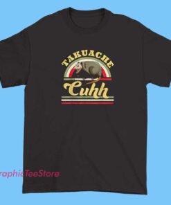Funny Mexican Trokiando Takuache Shirts 5 Humorous T-shirt featuring a cartoon-style takuache (mexican raccoon) with sunglasses, accompanied by playful text about 'trokiando' (trucking or cruising), showcasing vibrant colors and Mexican cultural elements.
