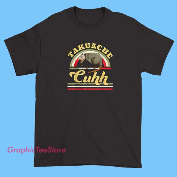 Funny Mexican Trokiando Takuache Shirts 2 Humorous T-shirt featuring a cartoon-style takuache (mexican raccoon) with sunglasses, accompanied by playful text about 'trokiando' (trucking or cruising), showcasing vibrant colors and Mexican cultural elements.