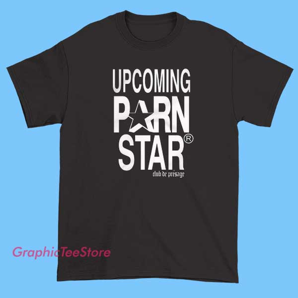 Logo Graphic Upcoming Pornstar Shirt 2 A graphic T-shirt featuring a bold logo design that hints at an 'upcoming pornstar' theme, incorporating stylized text, provocative imagery, or suggestive graphics to create a striking and attention-grabbing visual statement.