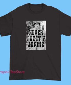 Never Trust A Junkie poster featuring bold quote typography, vintage punk aesthetic wall art print, edgy cultural slogan poster for home decor, music-inspired minimalist graphic design
