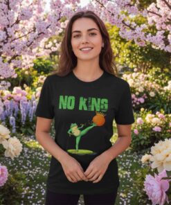 Funny frog protest no king shirt featuring cartoon frog holding anti monarchy sign, humorous political satire graphic tee, viral meme frog design for activists, streetwear fans, and freedom lovers.