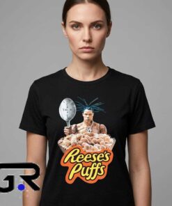 Travis Scott x Reese's Puffs shirt featuring playful music and cereal-inspired streetwear style, cotton short sleeve tee for fans, collectors, and casual outfits.