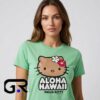 Aloha Hawaii Hello Kitty graphic tee, black cotton short sleeve shirt with tropical cartoon cat design, cute island vacation shirt for fans, sizes S to 2XL.
