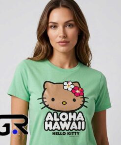 Aloha Hawaii Hello Kitty graphic tee, black cotton short sleeve shirt with tropical cartoon cat design, cute island vacation shirt for fans, sizes S to 2XL.