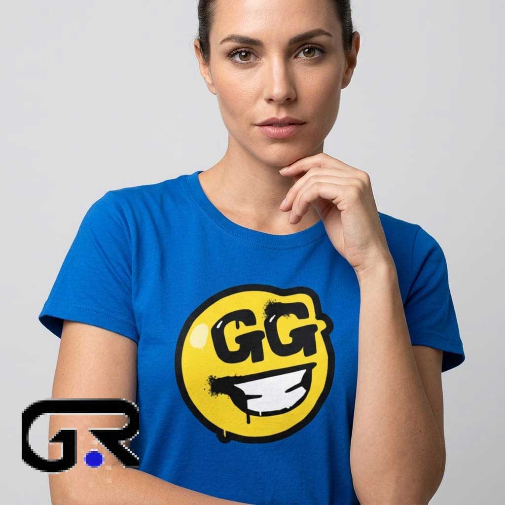 Fortnite Gg Emoji Tee Smiley Face Blue T-Shirt 1 Fortnite GG Emoji Smiley Face Blue T-Shirt featuring playful gaming artwork, cheerful smiley design, cotton short sleeve style, and video game inspired fashion.