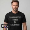 Sad Country Songs & Cold Beer slogan black T-shirt with country music graphic design, humorous beer saying, Southern style, and casual Western-inspired fashion.