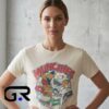 Scooby-Doo Munchies Graphic Cream T-Shirt, cotton short sleeve tee with vintage cartoon snack design, nostalgic animated shirt for fans, sizes S to 2XL.
