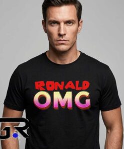 Ronald Omg Logo Tee Red and Pink Text shirt, black cotton short sleeve tee with bold streetwear graphic design, vibrant statement shirt for fans, sizes S to 2XL.